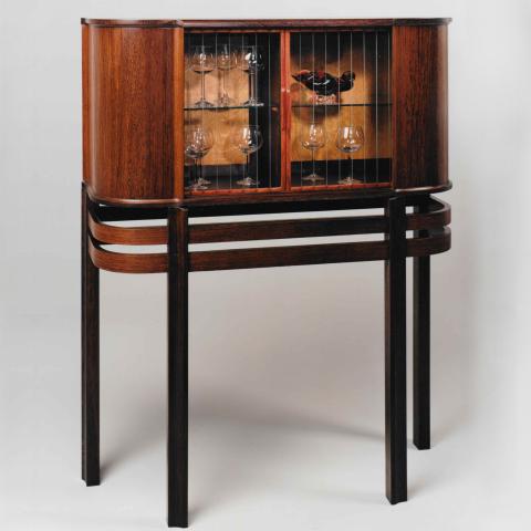 Bent front display cabinet with glass doors